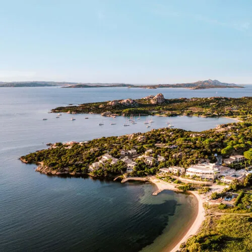 Breathtaking coastal view of 7Pines Resort and the islet Es Vedrà in Ibiza.